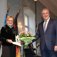 Innenminister Joachim Herrmann neben ehemaliger Präsidentin der Regierung von Oberbayern Maria Els