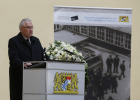 Innenminister Joachim Herrmann stehend hinter dem Rednerpult bei seiner Ansprache im Odeon.